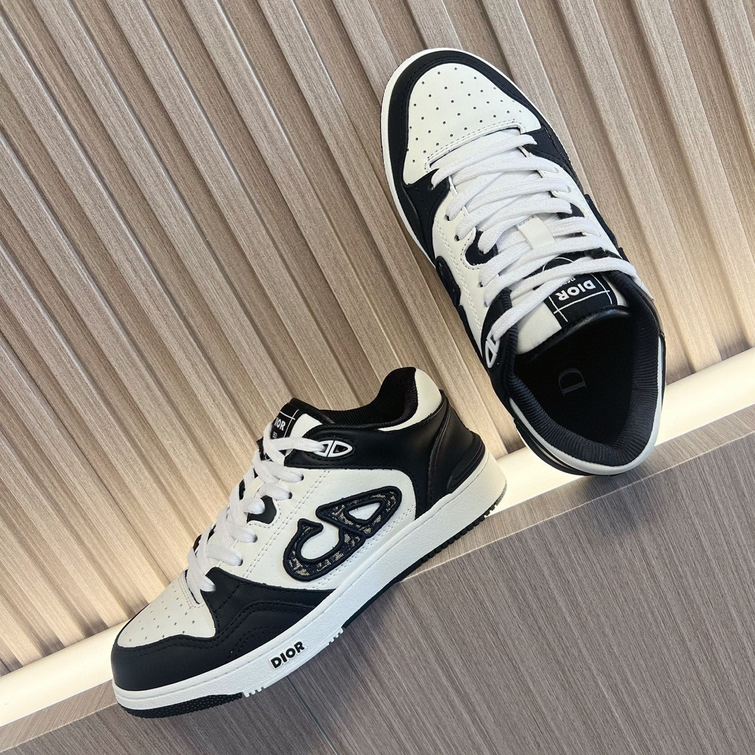 ua D*or b57 low-top sneaker black and white