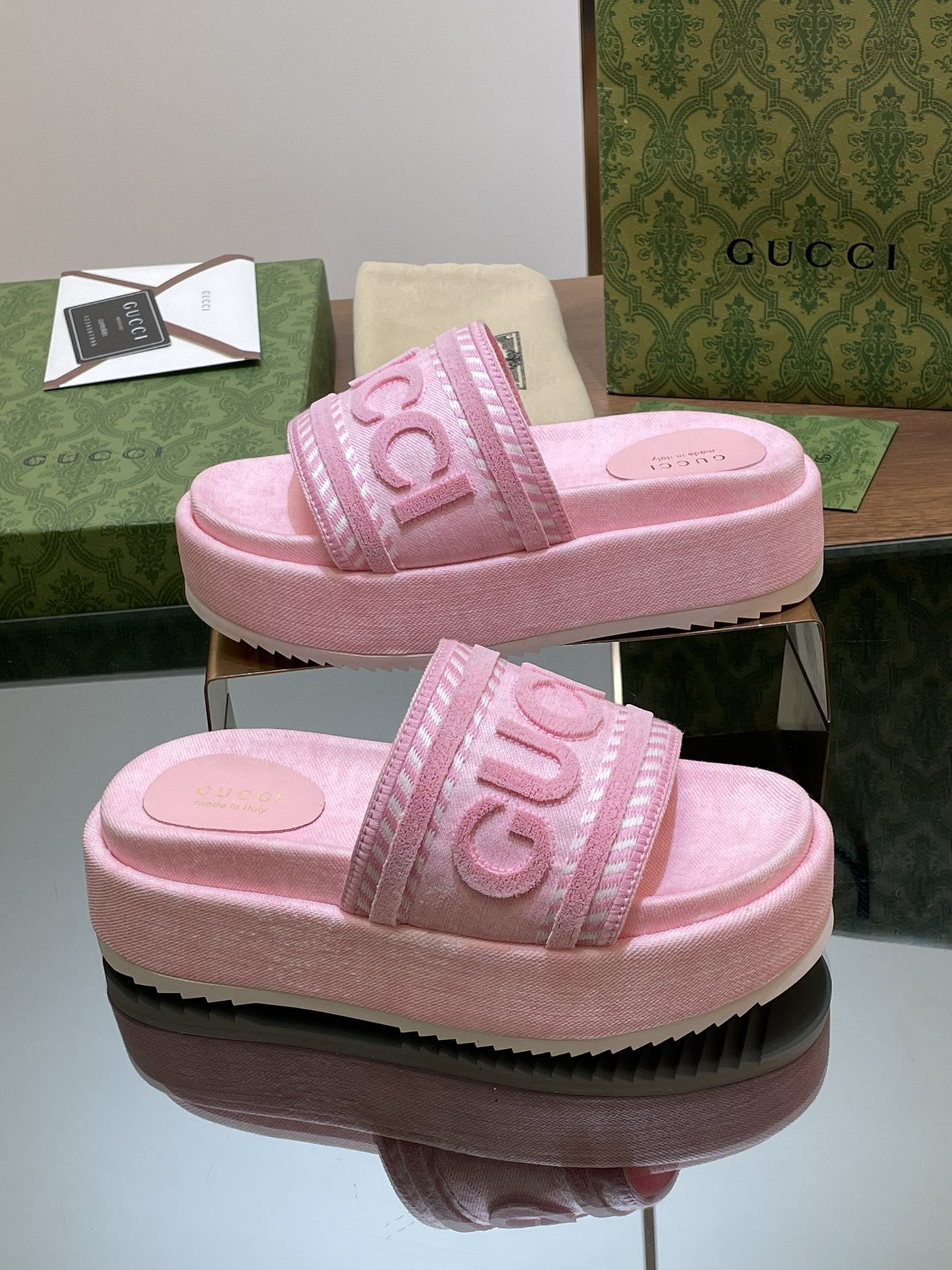 ua G*u*i slide sandal with G*u*i script